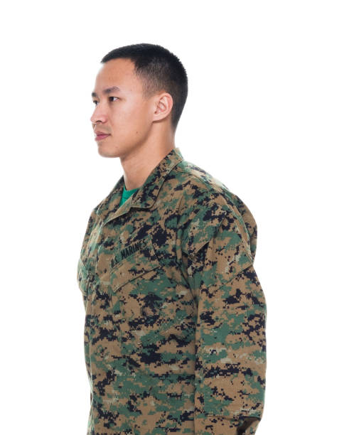 istock US Marine in uniform standing with hands by side 1050863180