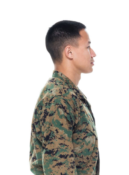 istock US Marine in uniform standing with hands by side 1050863210