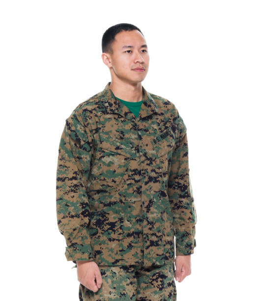 istock US Marine in uniform standing with hands by side 1050863216