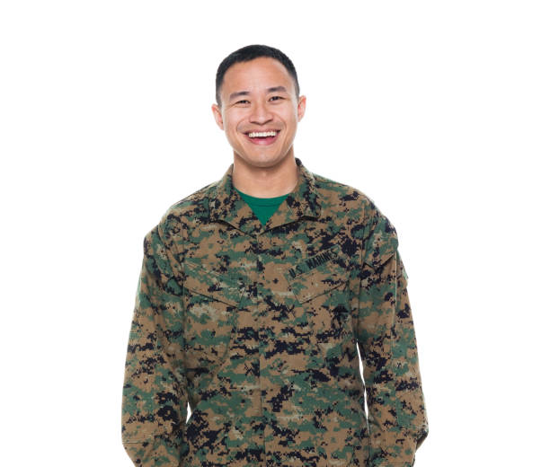 istock US Marine in uniform standing with hands by side 1050863236
