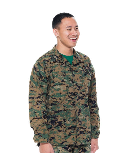 istock US Marine in uniform standing with hands by side 1050863290
