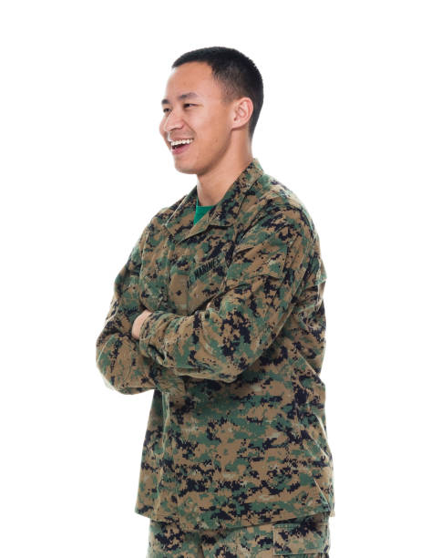 istock US Marine in uniform with arms crossed 1050863326