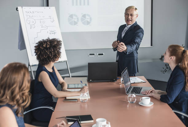 istock Business People Having a Seminar 1050865388