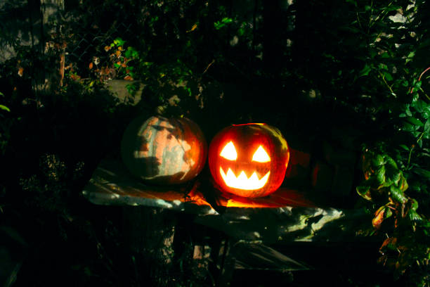 istock Scary ghost face glowing on Halloween in darkness 1050875030