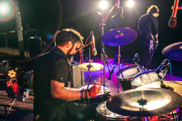 istock Rock n Roll Drummer at the stage 1050875392