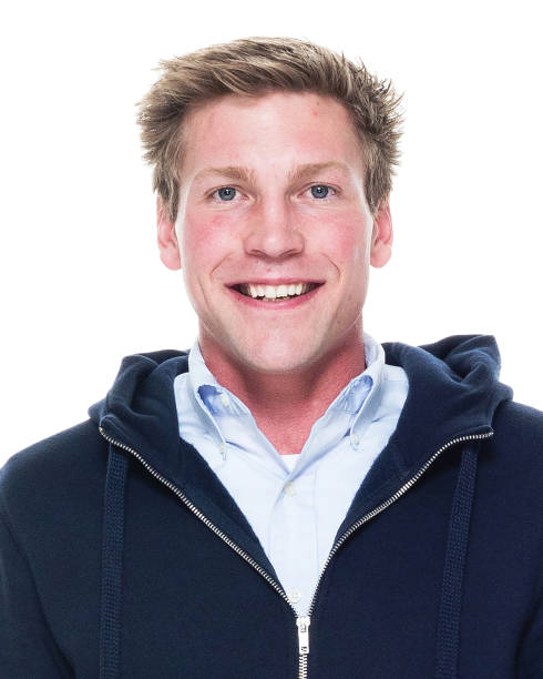 istock Attractive young male with hands by side 1050875636