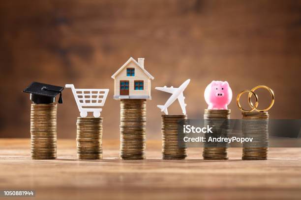 Expenses Icon On Stack Of Coins Stock Photo - Download Image Now - Financial Loan, Finance, Currency