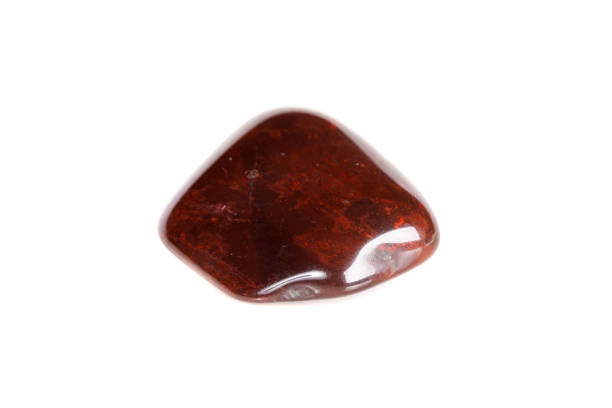 istock Macro mineral stone jasper on a white background 1050883110
