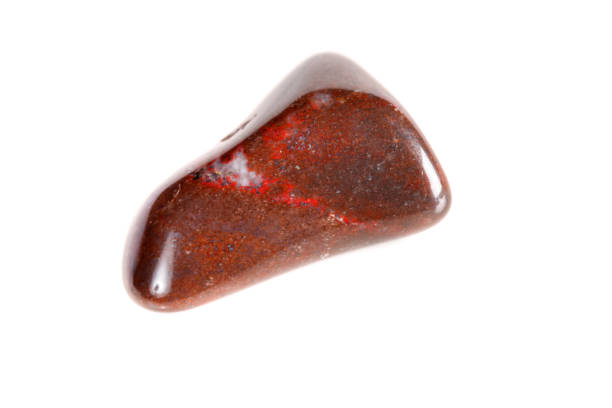 istock Macro mineral stone jasper on a white background 1050883472
