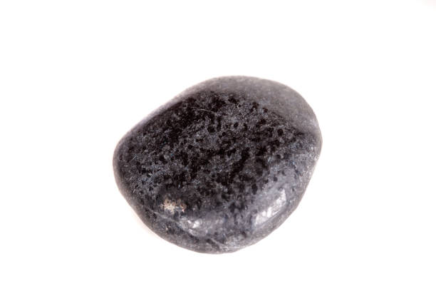 istock Macro mineral stone lignite on a white background 1050884192