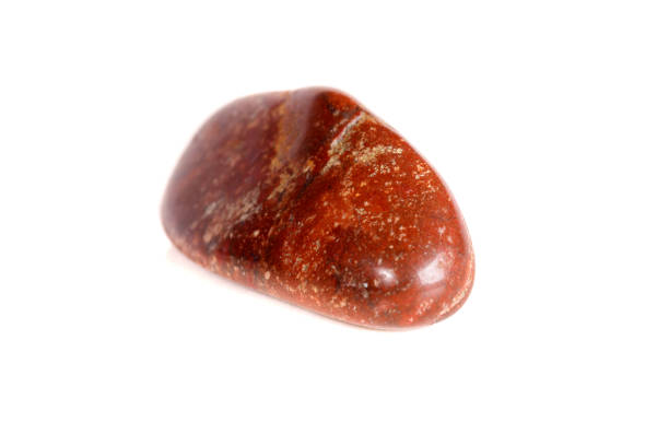 istock Macro mineral stone jasper on a white background 1050885896