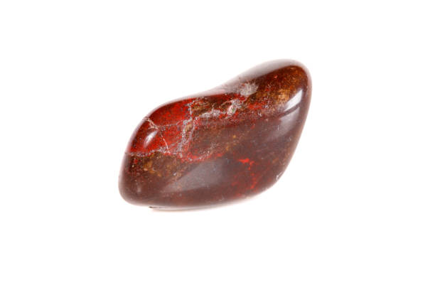 istock Macro mineral stone jasper on a white background 1050885942