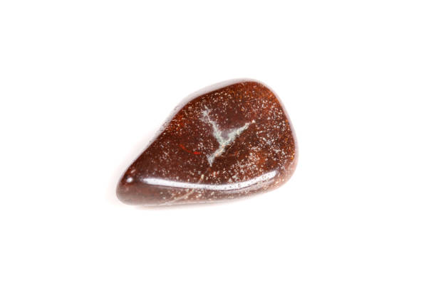 istock Macro mineral stone jasper on a white background 1050886024