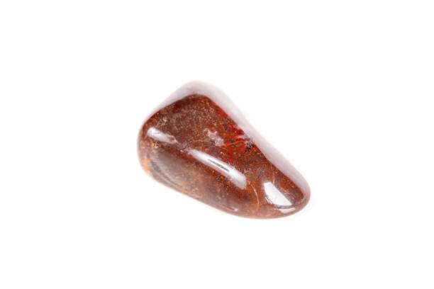 istock Macro mineral stone jasper on a white background 1050886240