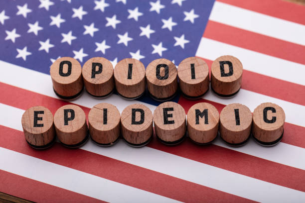 istock Opioid Epidemic Text On Cork Over American Flag 1050886440