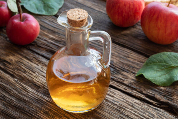 istock A bottle of apple cider vinegar with fresh apples 1050886984