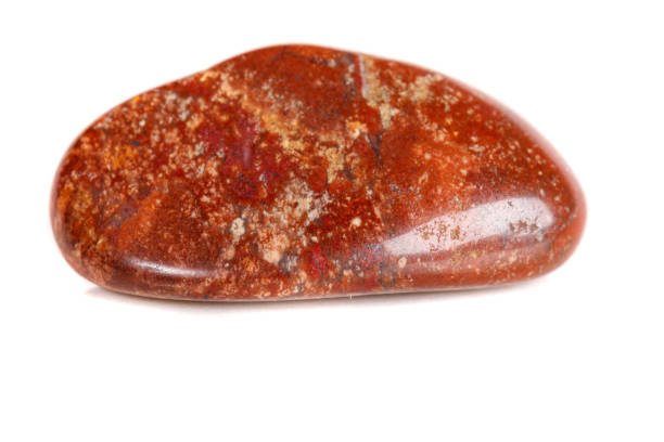 istock Macro mineral stone jasper on a white background 1050887268