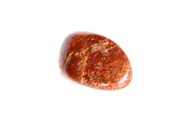 istock Macro mineral stone jasper on a white background 1050887314