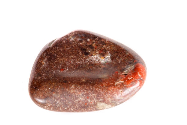 istock Macro mineral stone jasper on a white background 1050887346