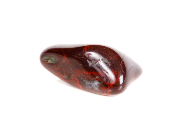 istock Macro mineral stone jasper on a white background 1050887398