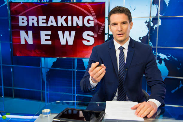 istock Breaking news male anchor 1050891518