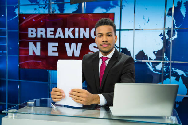 istock Breaking news male anchor 1050891634