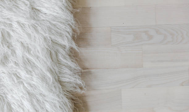 istock Sheepskin against tile floor. 1050906388