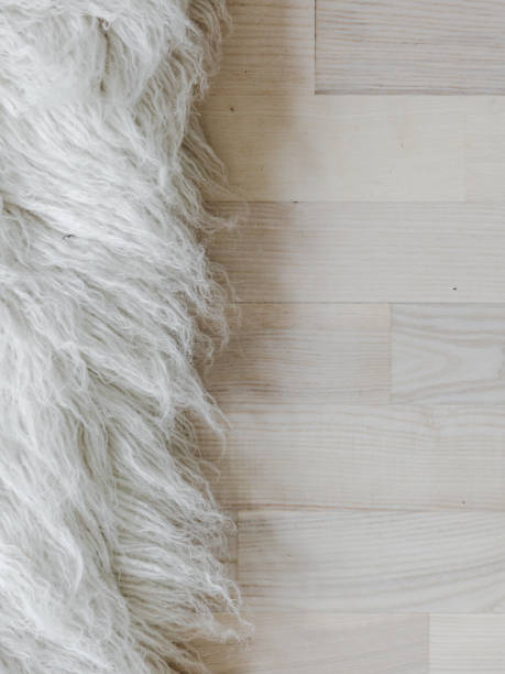 istock Sheepskin against tile floor. 1050906506