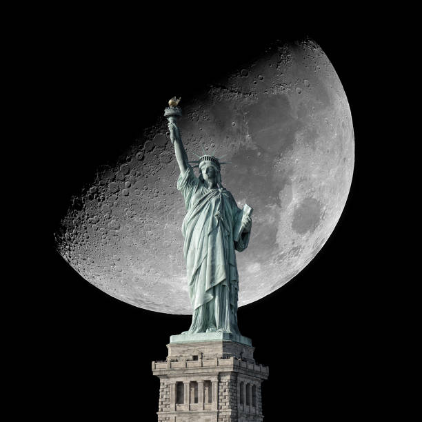 istock Statue of Liberty and Moon. 1050906856