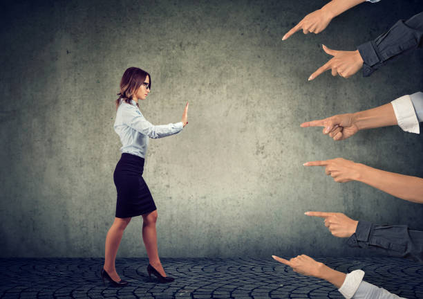 confident woman keeping hands in stop gesture, trying to defend herself - people strength leadership remote imagens e fotografias de stock