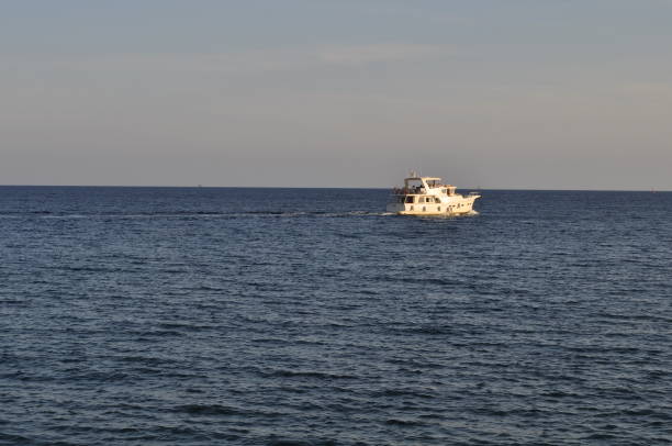 istock The beautiful boat in open sea 1050909858