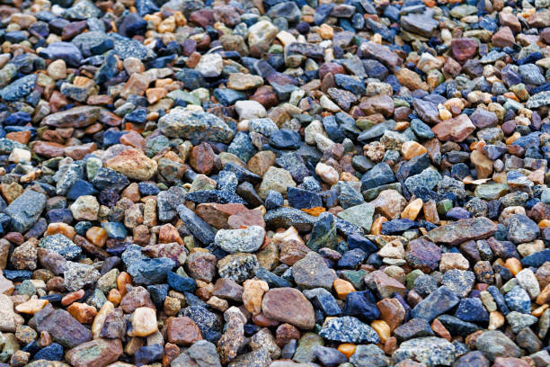 crushed stones texture background. stones construction rocks.grey granite gravel texture background. top view. - scree imagens e fotografias de stock