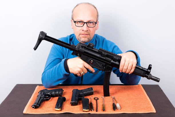 istock Keeping his gun in good working order 1050915856