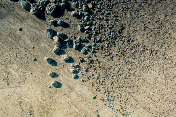 istock Gravel stones textured as abstract grunge background 1050921986