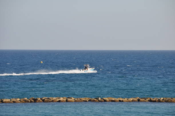 istock The beautiful boat in open sea 1050930456