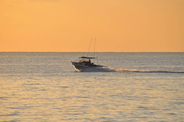 istock The beautiful boat in open sea 1050930778