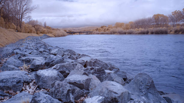 Infrared image of Manawatu river in Palmerston North New Zealand with stone protection on its banks Infrared image of Manawatu river in Palmerston North New Zealand with stone protection on its banks manawatu river stock pictures, royalty-free photos & images