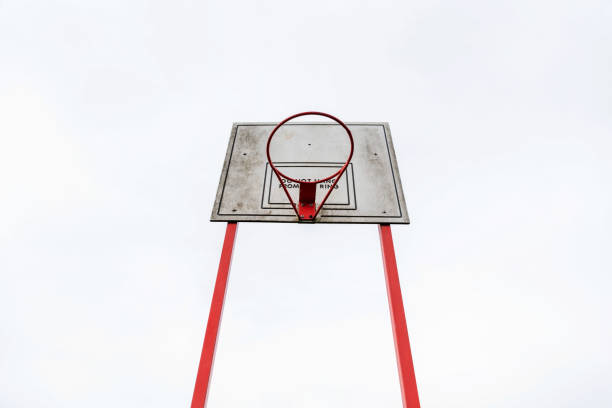 istock empty outdoor basketball over clody british sky 1050933884