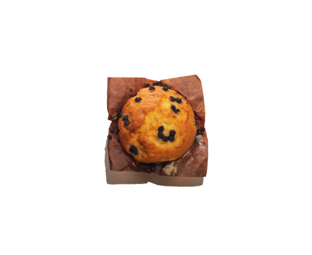 istock Fresh baked delicious muffin with chocolate on white background from above 1050950486
