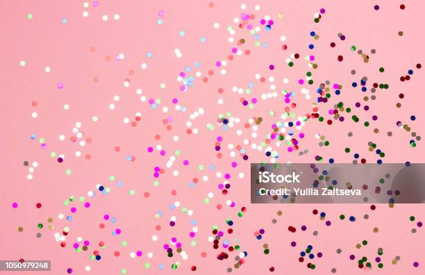 Festive Pastel Pink Background With Metallic Confetti Stock Photo - Download Image Now