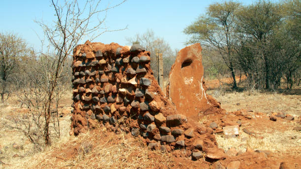 istock Broken Rock and Mortar Wall of Home from the Past 1050996748