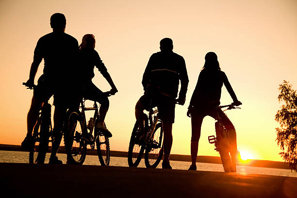 friends on bicycles stock photo