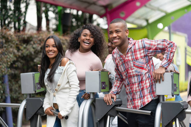 Happy family arriving at an amusement park