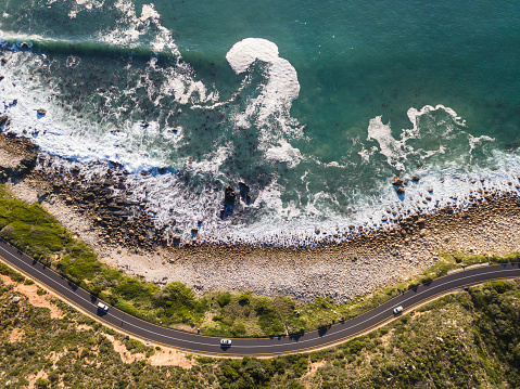 Aerial view over a coastal road near False Bay in Cape Town, South Africa