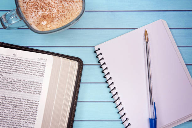 istock A Bible on a Wooden Table Set out for a Personal Bible Study 1051014438