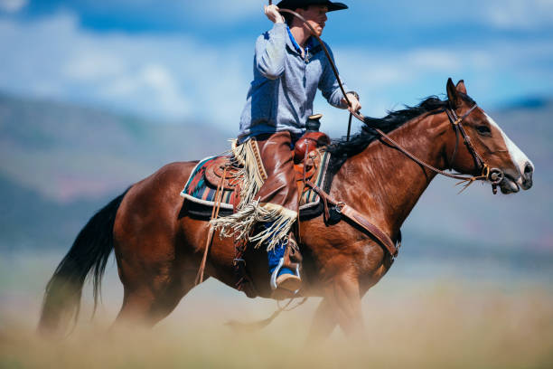 istock Cowboy galloping in Utah, USA 1051021452