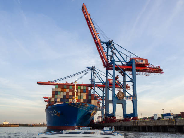 Hamburg, Germany. The port, container ships and cranes