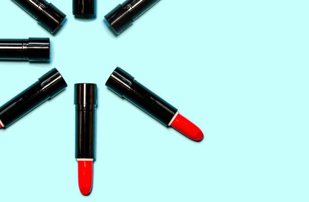 istock Set of red lipstick isolated equalled a circle on blue color background. 1051038438