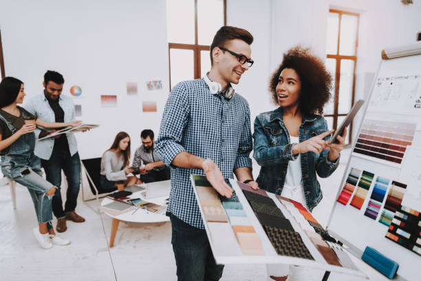 istock Designers. White Guy. Girl. Color. Design. 1051052382