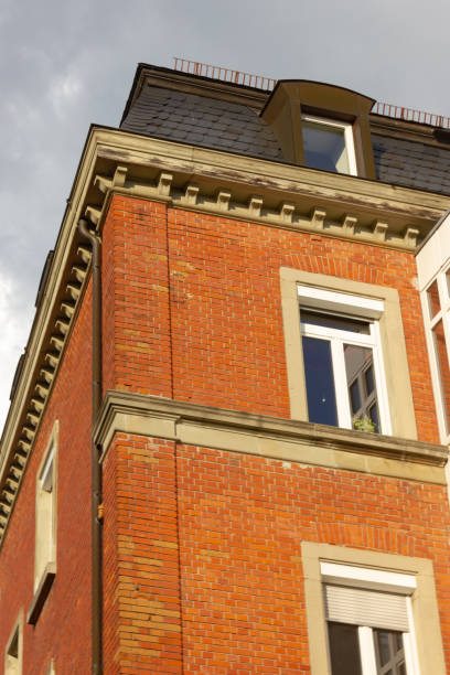 istock facades and  windows of buildings 1051058318